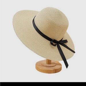 Elegant Beige Sun Hat with Black Ribbon